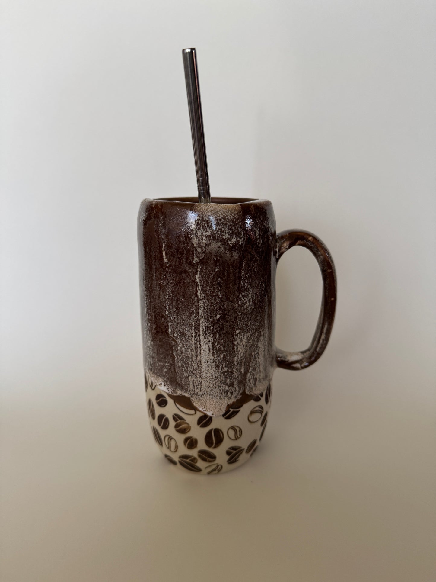 Coffee Bean Tall ToGo Cup comes with a metal straw