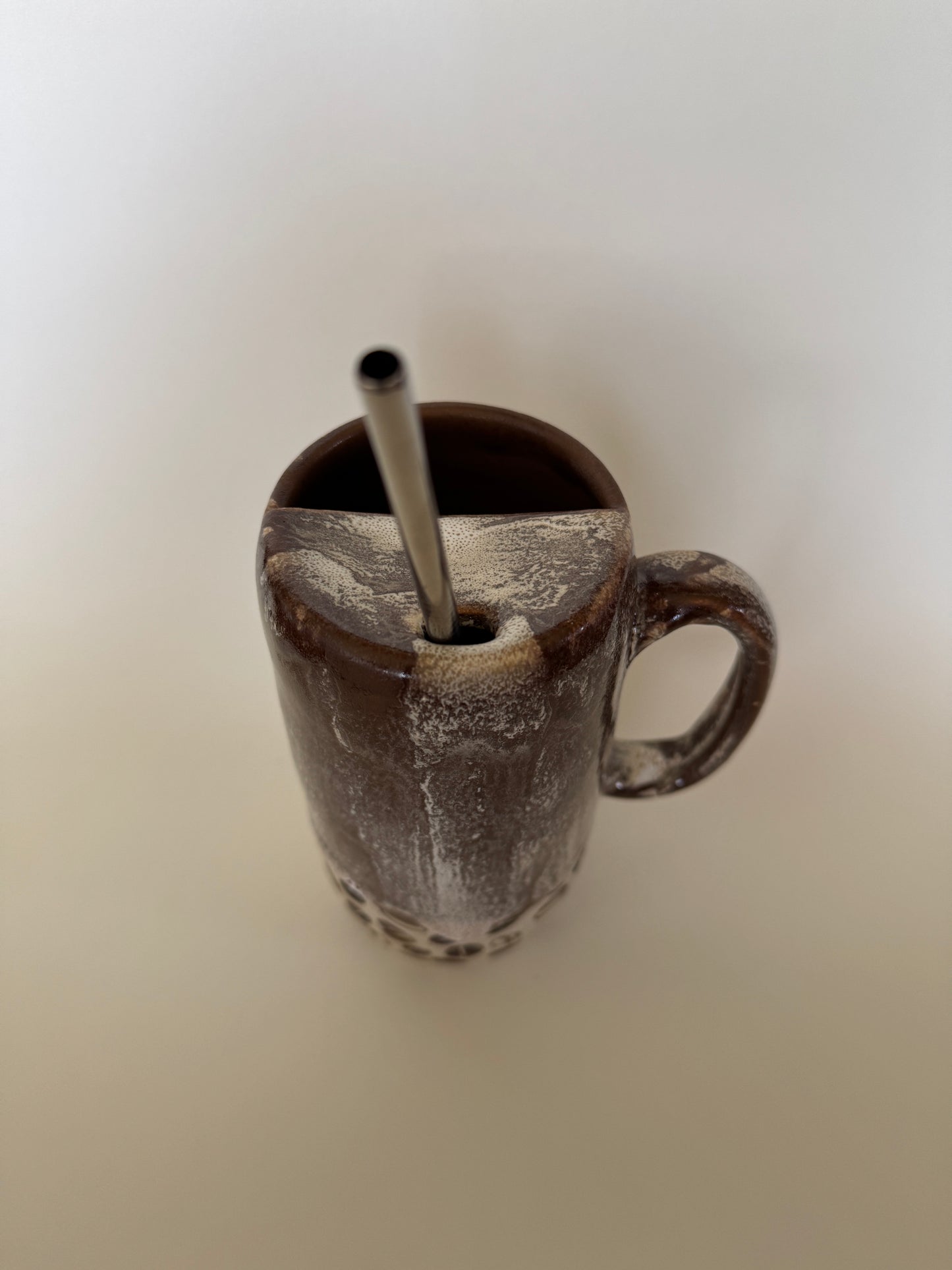 Coffee Bean Tall ToGo Cup comes with a metal straw