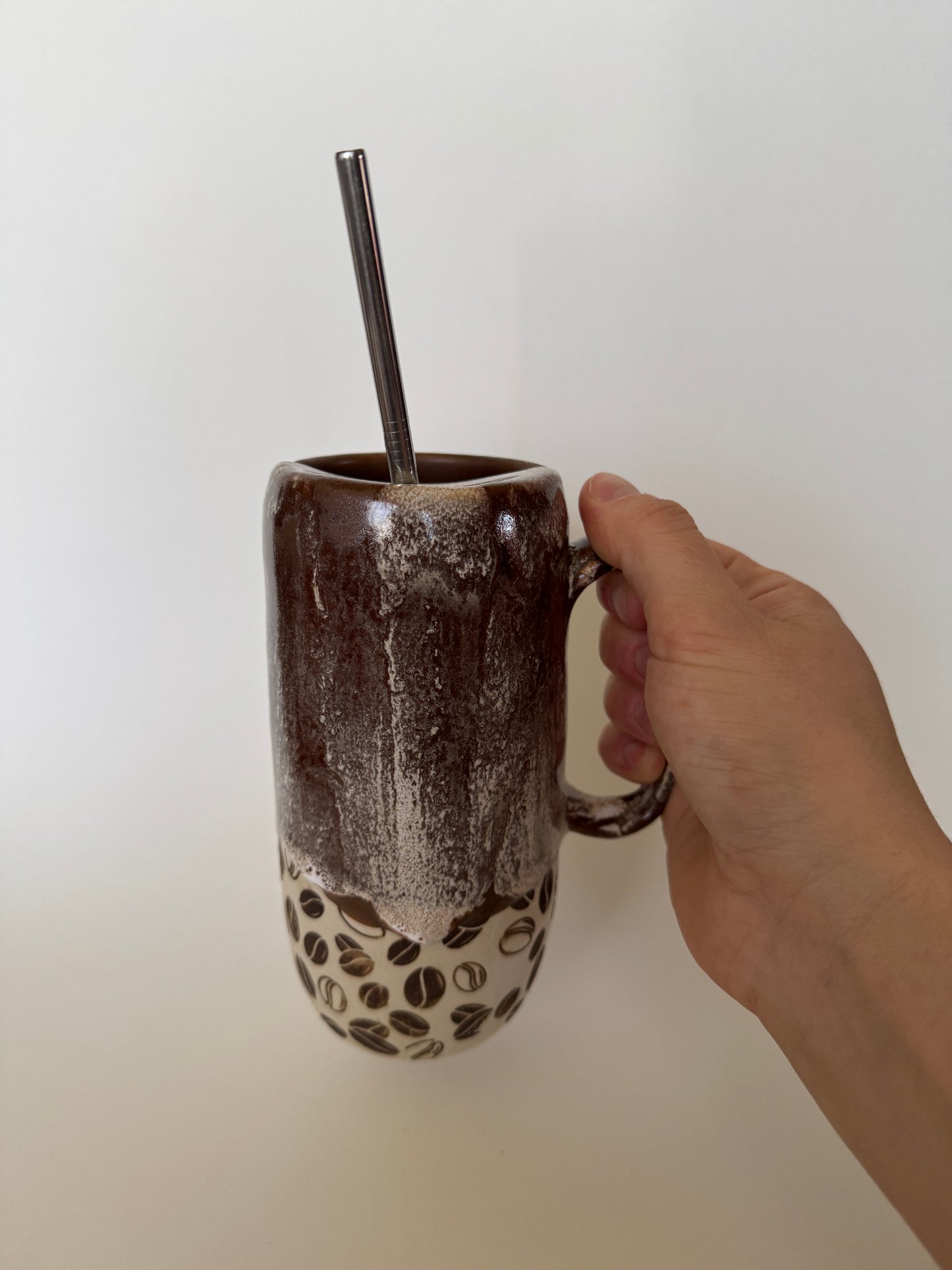 Coffee Bean Tall ToGo Cup comes with a metal straw